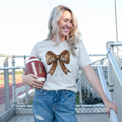 Coquette Football Bow tan tee