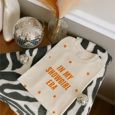 Cream Showgirl Era tee