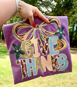 Give Thanks cutie on plum tee