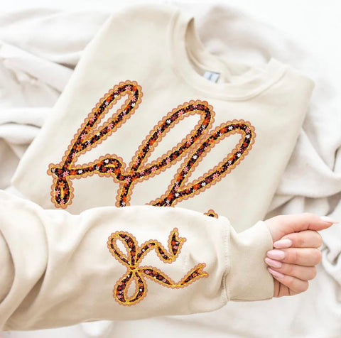 Cursive Fall - sleeve detail tan sweatshirt