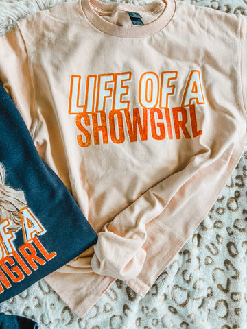 Life of a Showgirl peach tee