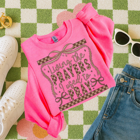 Living the prayers I used to pray, checker design sweatshirt/tee
