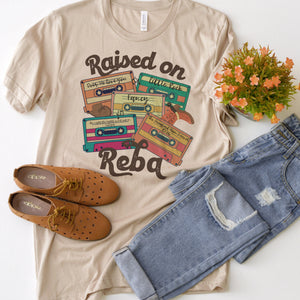 Raised on Reba - tapes tee