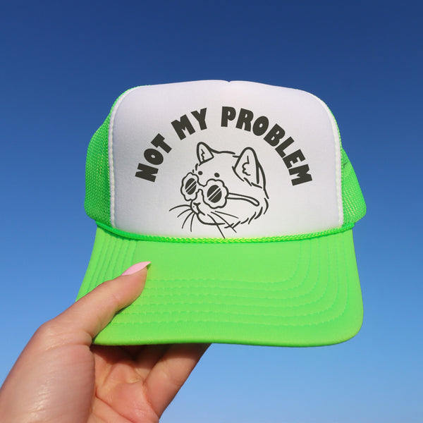 Not My Problem trucker hat / tee