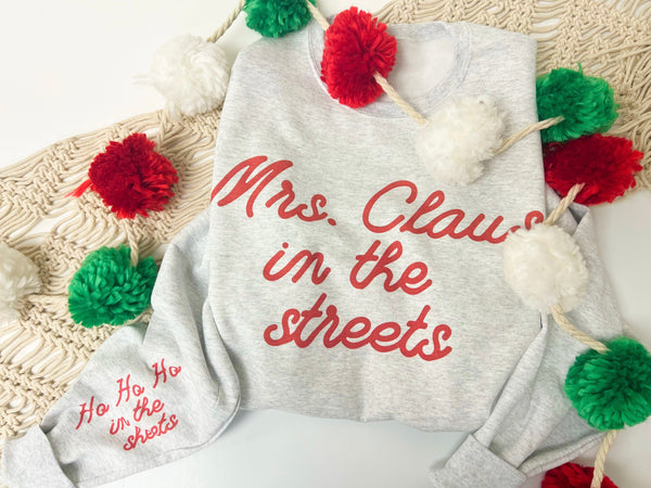 Mrs. Claus in the streets… sweater