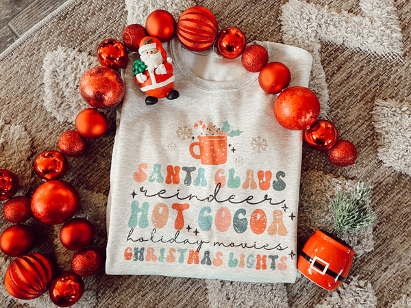 Santa, reindeer, cocoa, holiday morgues & Christmas lights sweater