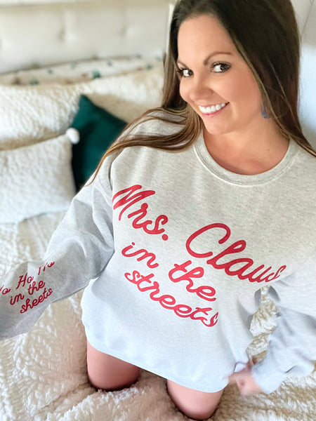 Mrs. Claus in the streets… sweater