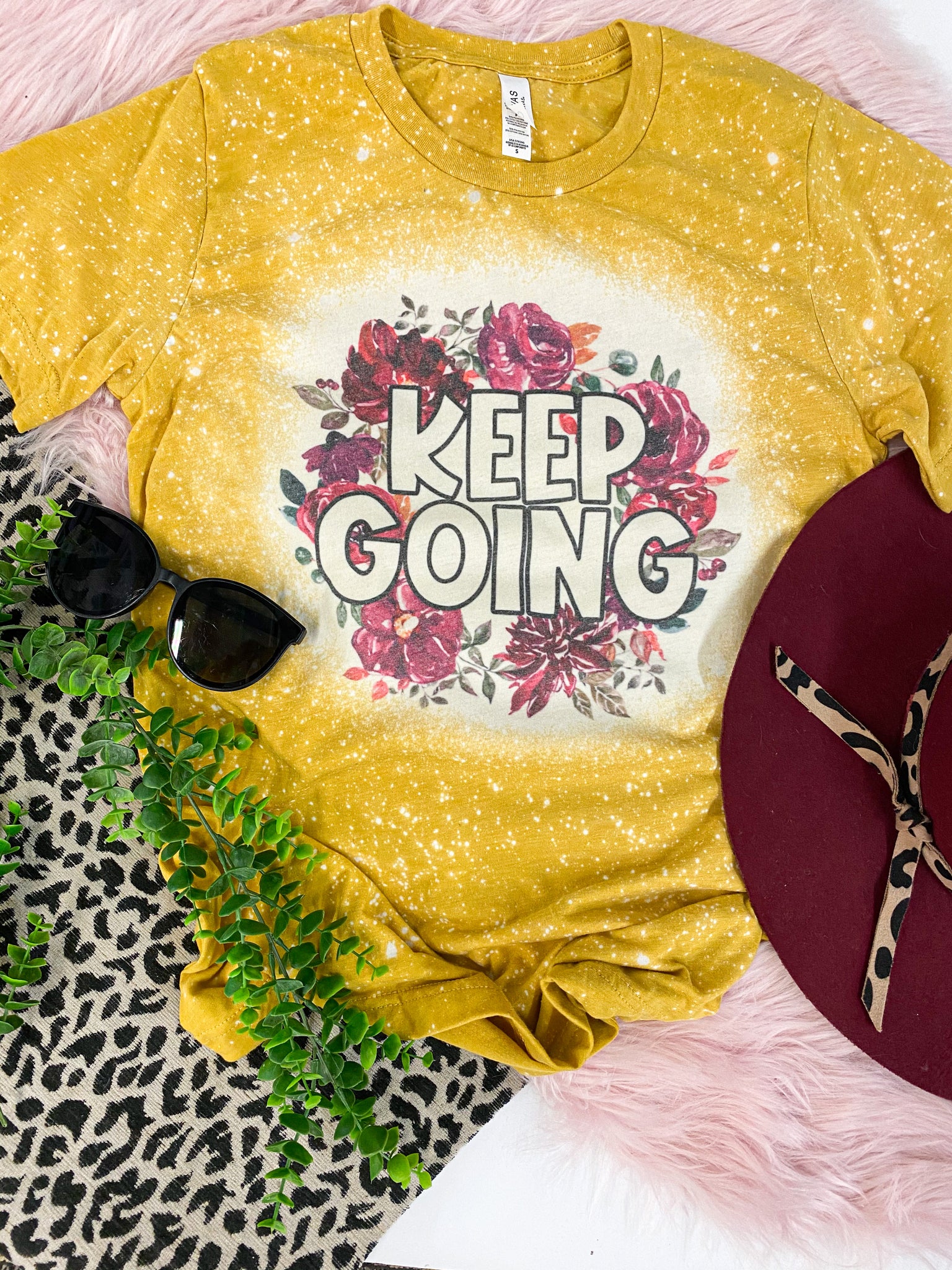 Keep going floral mustard tee